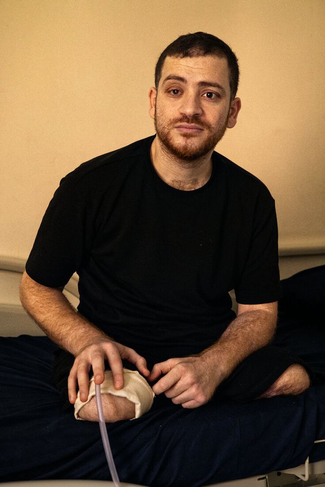A photograph of Abdallah Al-Hajj, taken in a hospital in Qatar, shows Al-Hajj after the strike, with both legs amputated. The photograph appeared in a New York Times article about those injured in the IDF's war on Gaza. https://www.nytimes.com/card/2024/11/19/world/middleeast/palestinians-qatar-israel-hamas-war