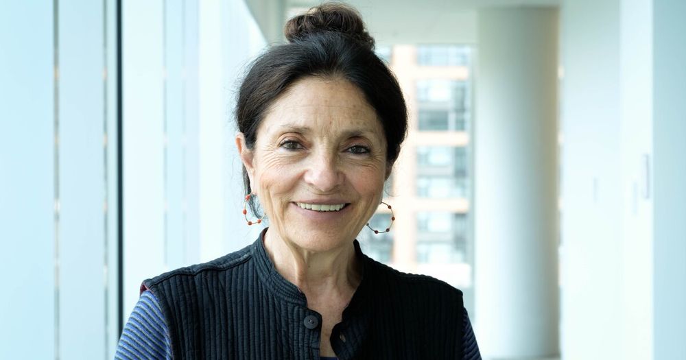 Headshot of NPR correspondent Sylvia Poggioli, smiling broadly
