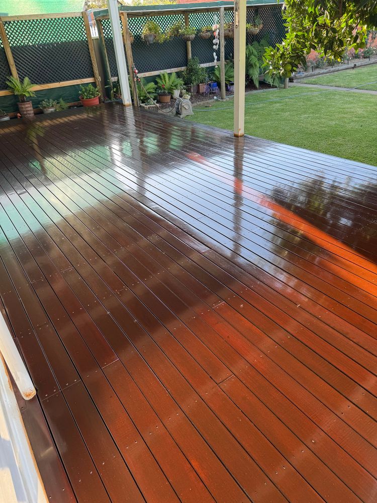 Pic of a nice shiny Merbau wooden deck, all recently  oiled. 