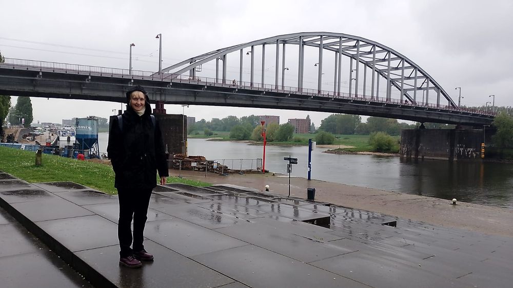 Braving the rain to prove the bridge is no longer too far...