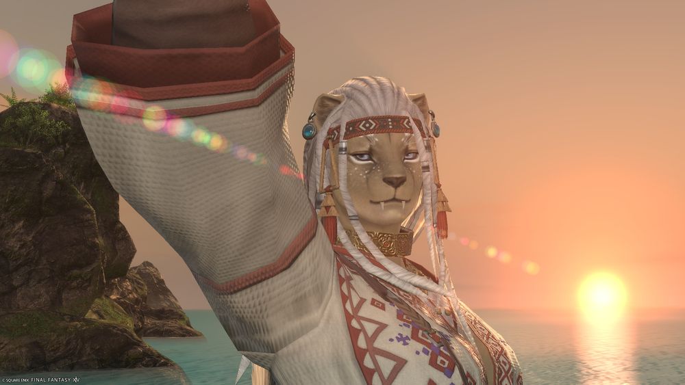 My character wearing the Island Shepherd Set acquired from the quest, wielding her golden twinblades as the sun sets in the background.