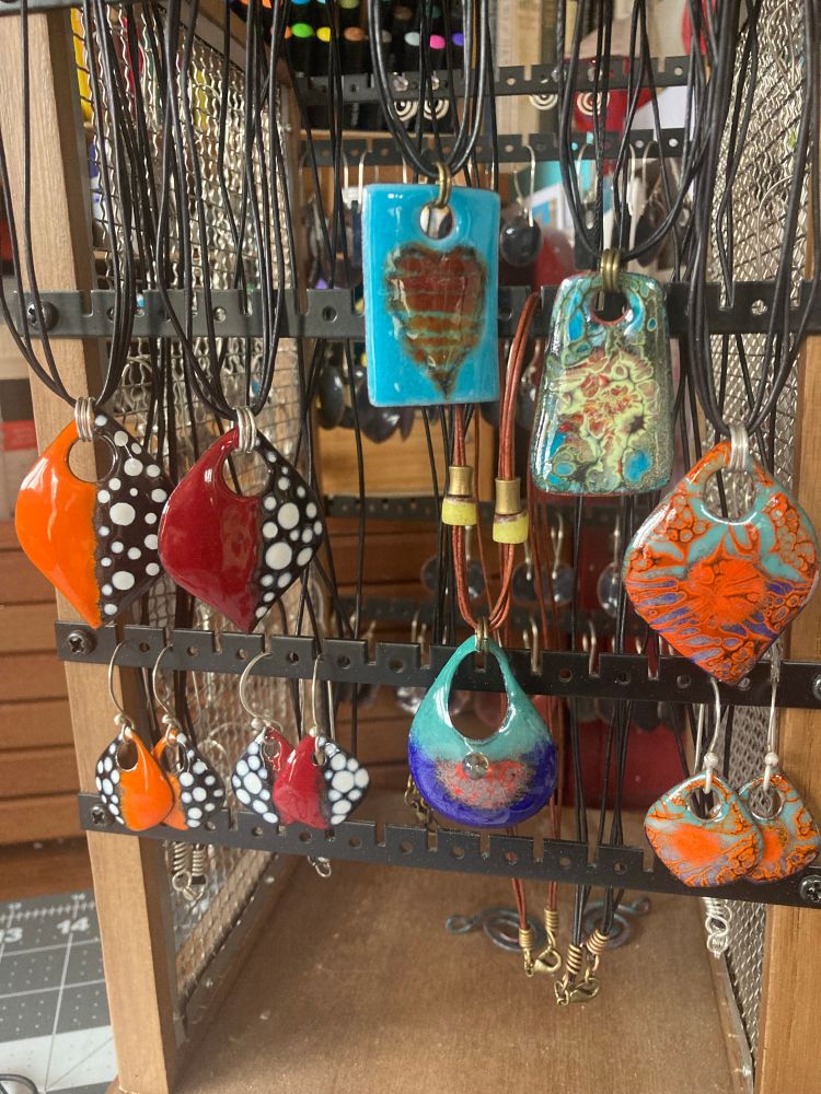 Torch fired enamel pendants and earrings. 
