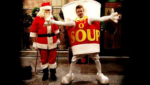 SNL sketch Liquorville Sketch with Justin Timberlake dancing wearing a Cup O’Soup costume while Santa Claus looks on. 