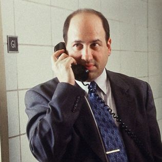 Photo of Maurice Levy on a telephone. He was a character on The Wire. Levy was the defense attorney who advised and represented several of the drug dealers. 