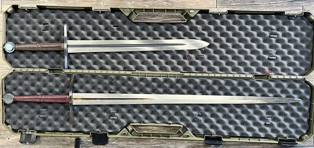 Two swords laid out in a hard rifle case.

Sword above is the MTT #14, and the sword below is the XVIa.4