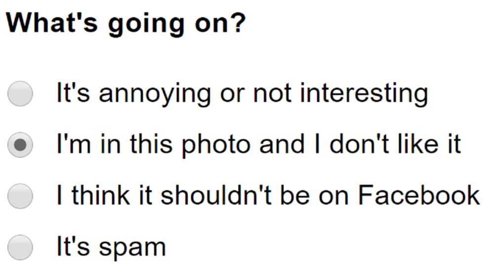 The old facebook reporting box that asks what’s going on and the I’m in this photo and I don’t like it checked. 