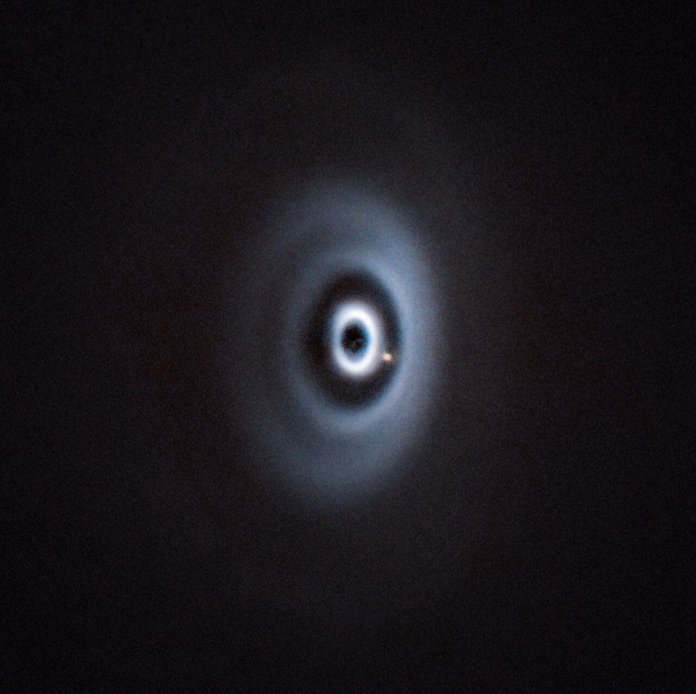 What appears to be a ripple in space, is today’s Picture of the Week depicting a newborn planet eating its way through its dusty cradle as it orbits its host star. This image, taken with ESO’s Very Large Telescope (VLT) in Chile, is the first clear detection of a baby planet in a disc with multiple rings.