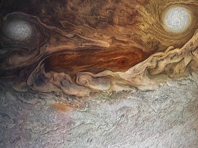 A close up of some storms on Jupiter forming a βfaceβ with two white eyes and an orange mouth.