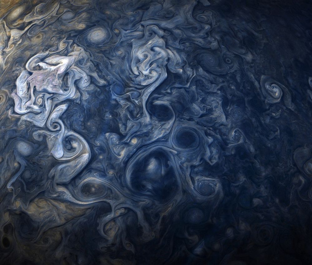 Swirling blue and white clouds and storms on Jupiter, resembling paint on a canvas.

Image credit/processing: Gerald Eichstädt and @_TheSeaning /NASA/JPL-Caltech/SwRI/MSSS