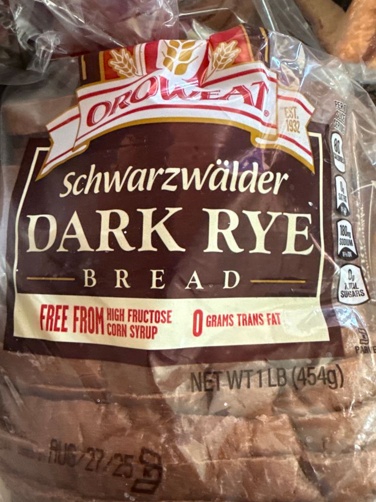 A photo of ‘Schwarzwälder dark rye bread’ - a (bad) pun due to similarity with the name of infamous Simpsons writer John Swartzwelder. 