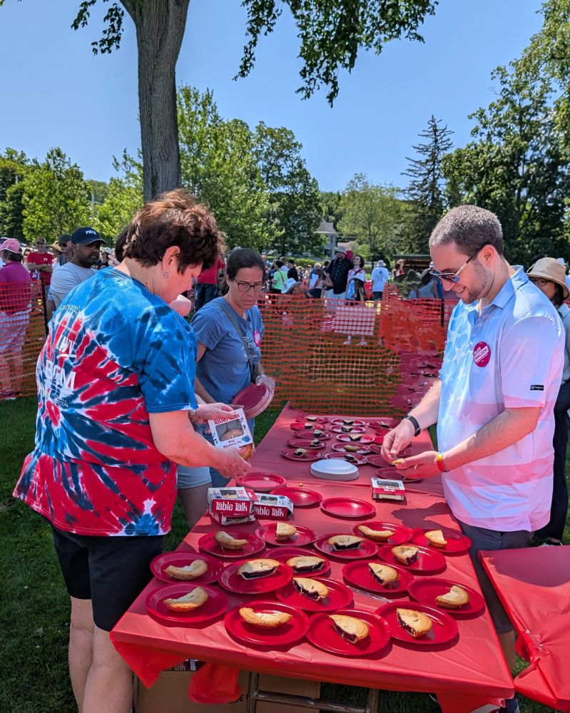 Alex, some campaign volunteers, and some others setting up the pies for the event