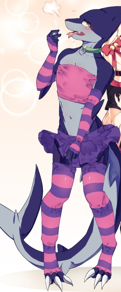 Shark wearing a green collar, pink tube top, purple skirt,  and pink and purple arm warms and thigh highs looking blushy.