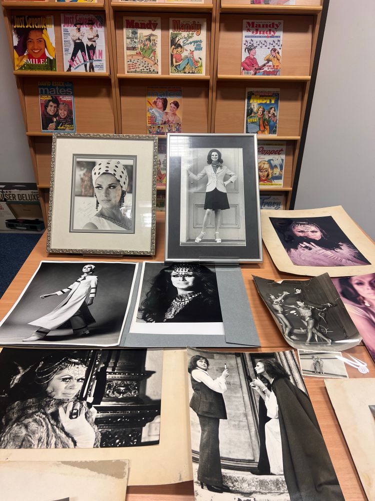 Section of photographs on a table 