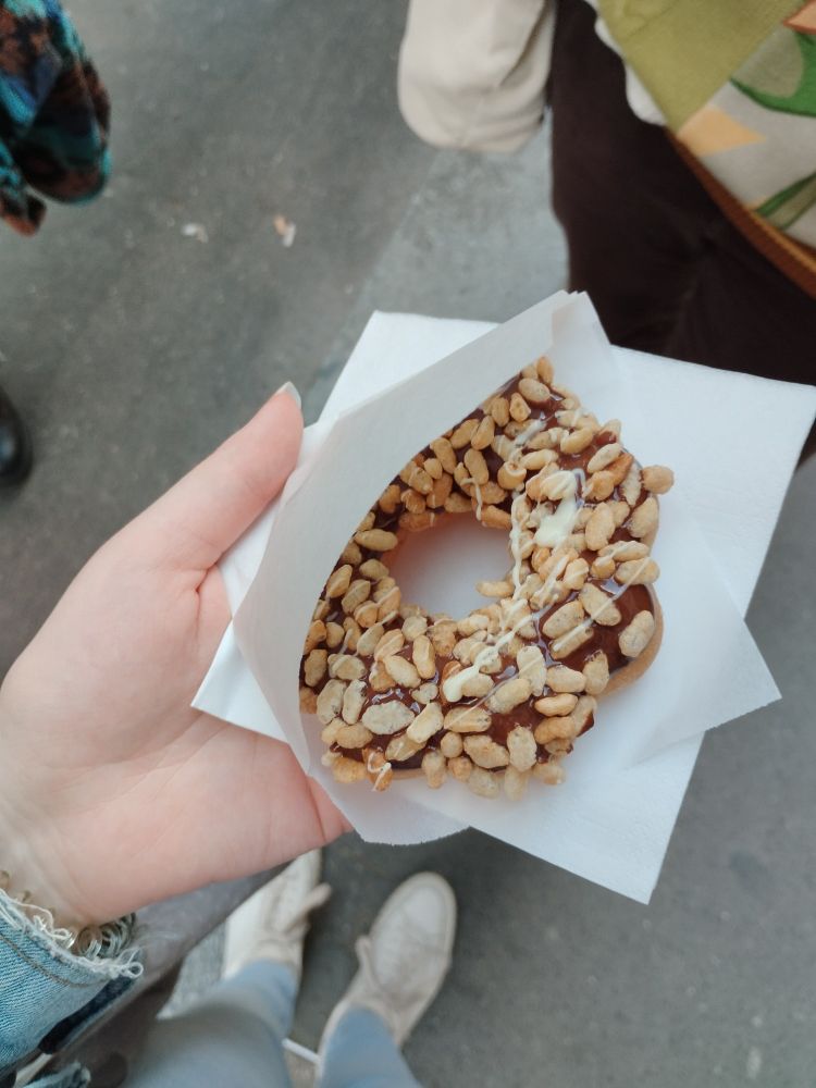 📍 PonPon Café
🍩 A picture of a flower shaped donut with chocolate topping and puffed rice (it was sooooo good)