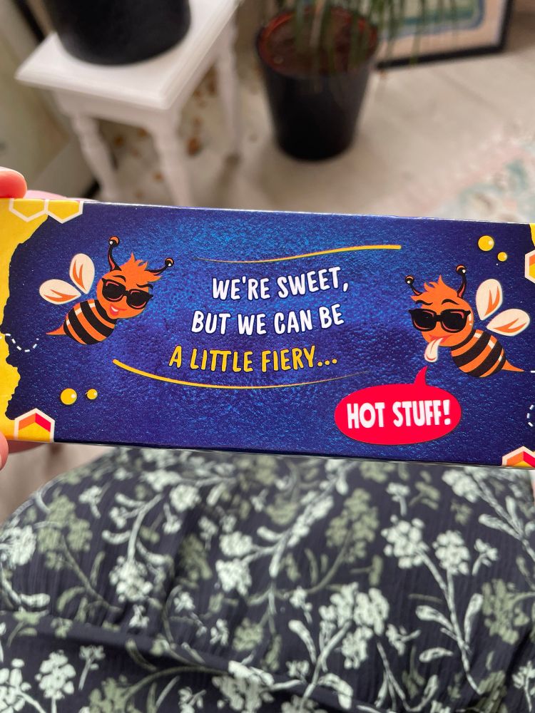 The back of a hot honey Jaffa cake box that says “we’re sweet but we can be a little fiery”. 