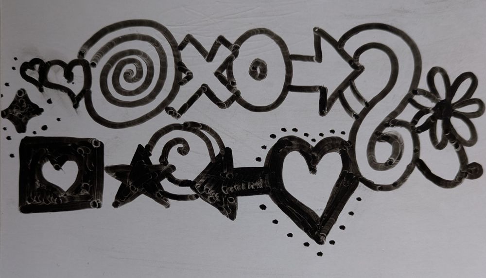 various hand drawn symbols that can represent love to me: hearts (plain and fancy ones), spirals, xo, arrows pointing to symbols, a daisy, different kinds of stars, and the P4A heart symbol 