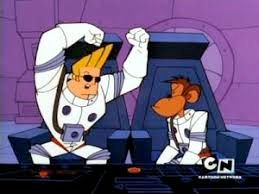 Johnny Bravo and a monkey, both wearing white spacesuits, sit in the cockpit of a spaceship as Johnny flexes his muscles.