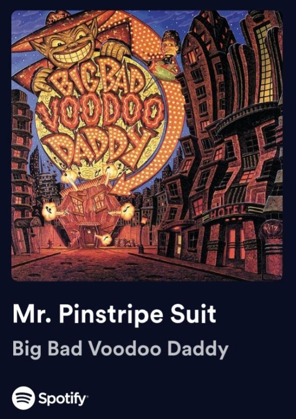 Big Bad Voodoo Daddy Album Cover. Depicting large sign saying Big Bad Voodoo Daddy with an arrow pointing to an exploding building
