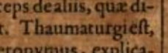 the phrase "Thaumaturgi est" in an old book, but the word spacing makes it look like "Thaumaturgiest"