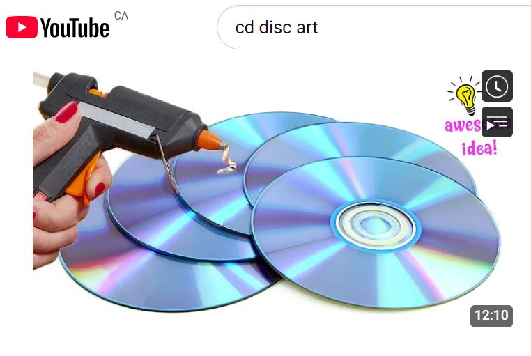Pic of hot glue gun and CDs