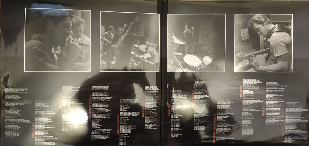Inside gatefold cover with pictures of the Band and lyrics to the songs 
