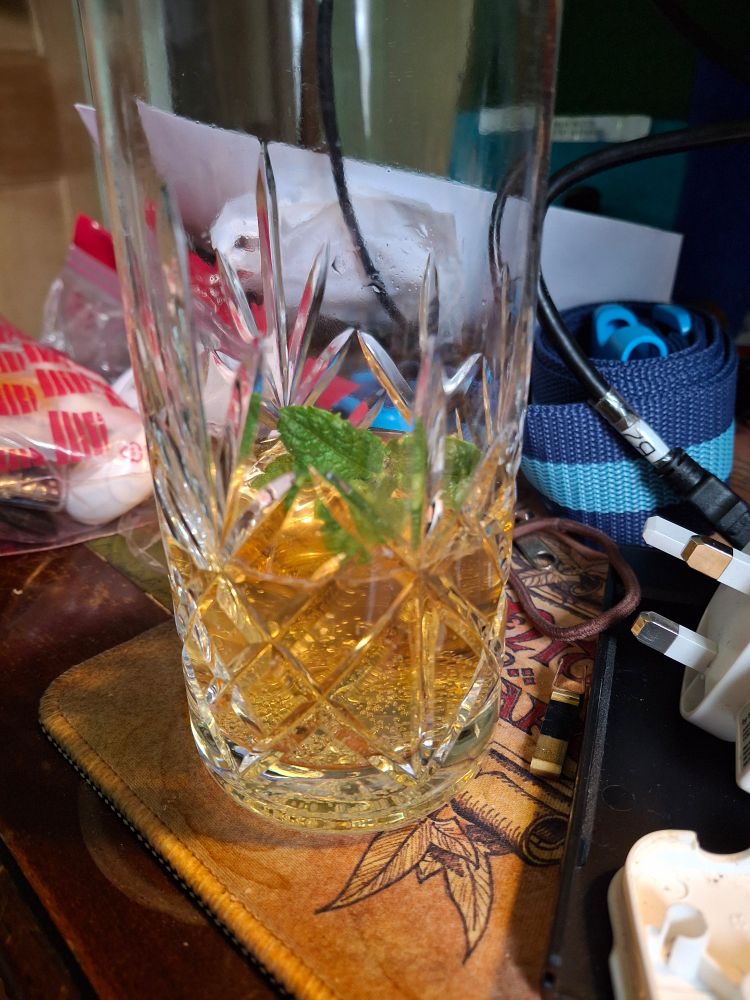 A glass of what is surprisingly a non alcohol pims substitute. After all it is work time for another hour. 