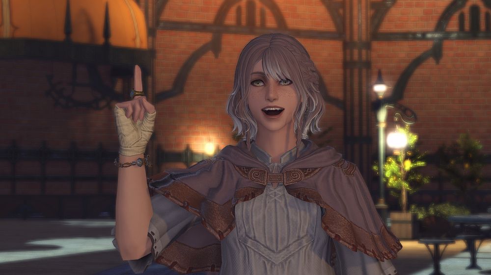 Nayzak in Crystarium. She is a pale skinned hyur woman with short pink hair and freckles. The tips of her hair are white. She is posed mid speech pointing upwards.
