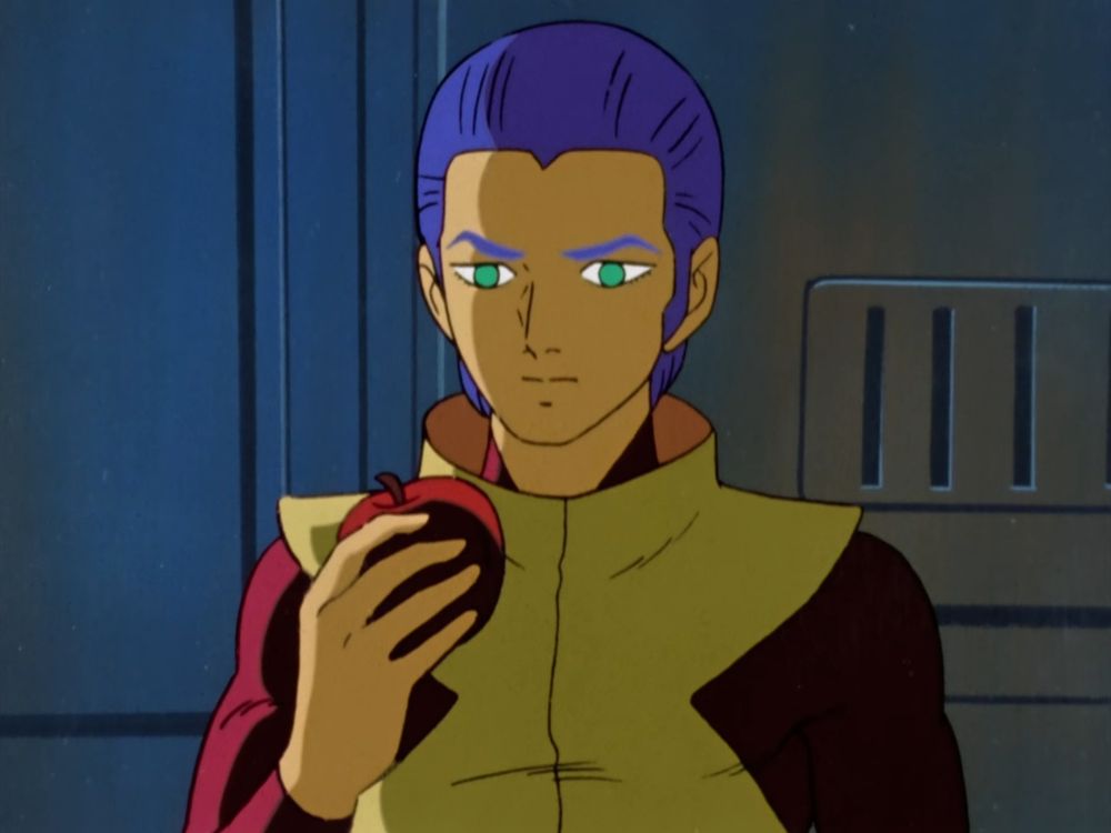 Screenshot of Gije Zaral from Space Runaway Ideon episode 30, holding the apple Sheryl brings him