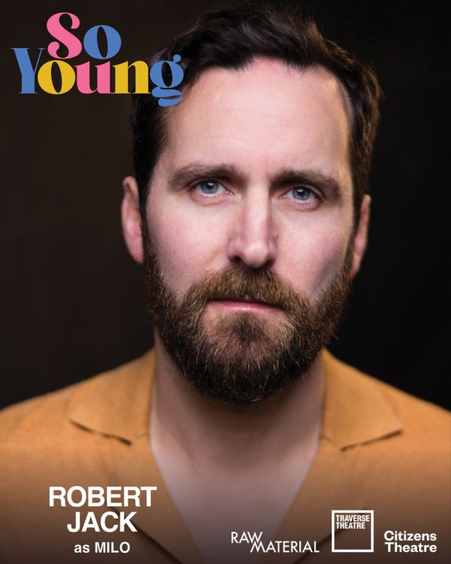 Close-up portrait of a bearded man in a brown shirt against a dark background. The text reads "So Young," "Robert Jack as Milo," with theatre logos below.