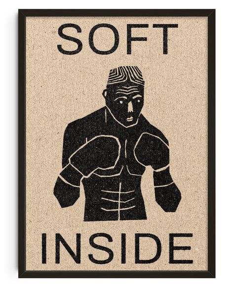 Modernist cartoon of a boxer with the words 'Soft Inside' above and below