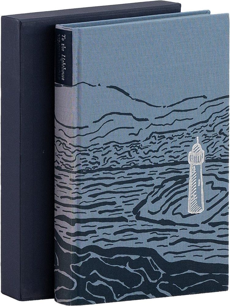 Hardcover edition of Virginia Woolf’s To the Lighthouse, published by The Folio Society. The clothbound cover is illustrated with abstract waves in shades of blue and gray, with a white lighthouse near the bottom right. The book rests in a dark navy slipcase.