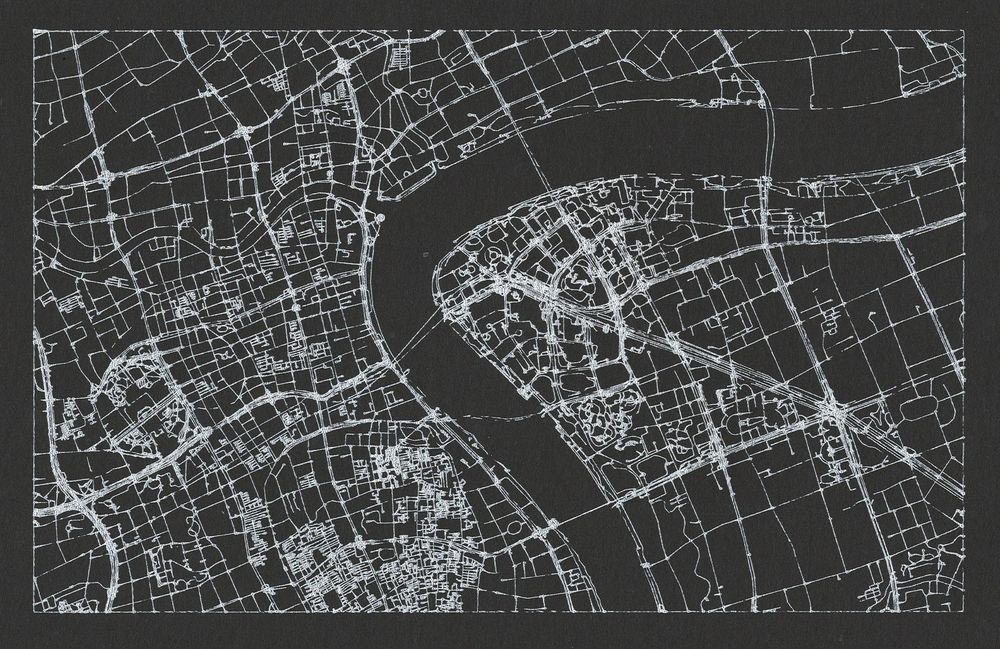 A pen plotted street map in silver ink on black paper with a river bend visible in the negative space in the center.