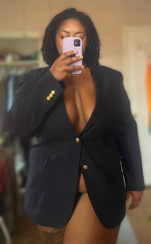 Sage wears a blazer with nothing underneath 