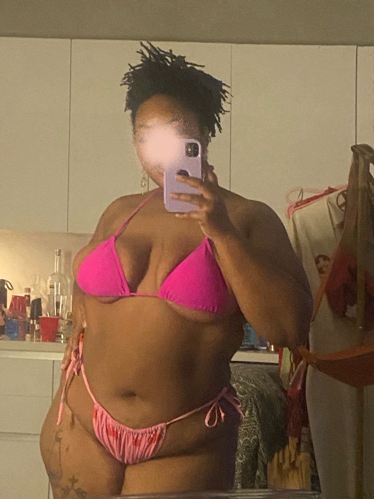 Sage wears a pink bikini