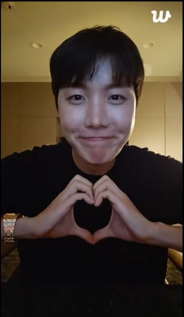 Hobi making hand heart dimples smiling cutely. From live in LA