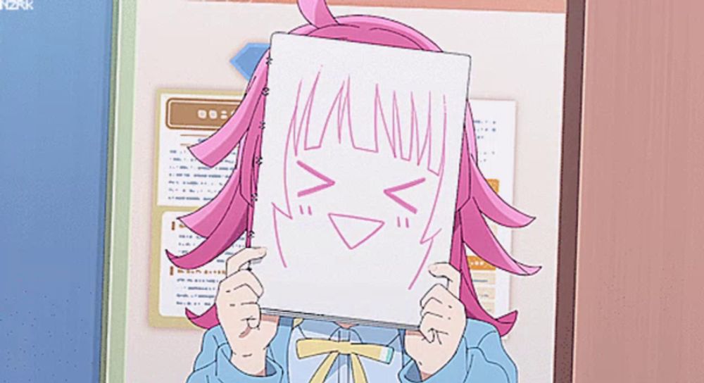 a girl with pink hair is holding a piece of paper in front of her face that says " n "