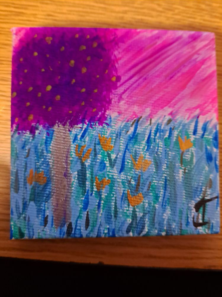 An alien meadow with blue grass, gold flowers, a purple tree with silver bark under a pink sky. 