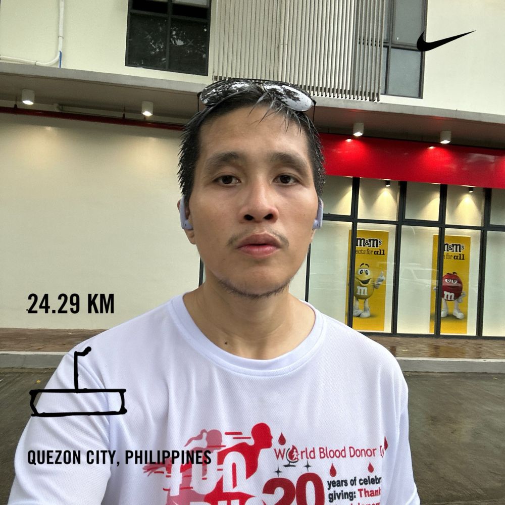 User rainncarnation absolutely soaked from walking in the rain at the University of the Philippines Shopping Center.