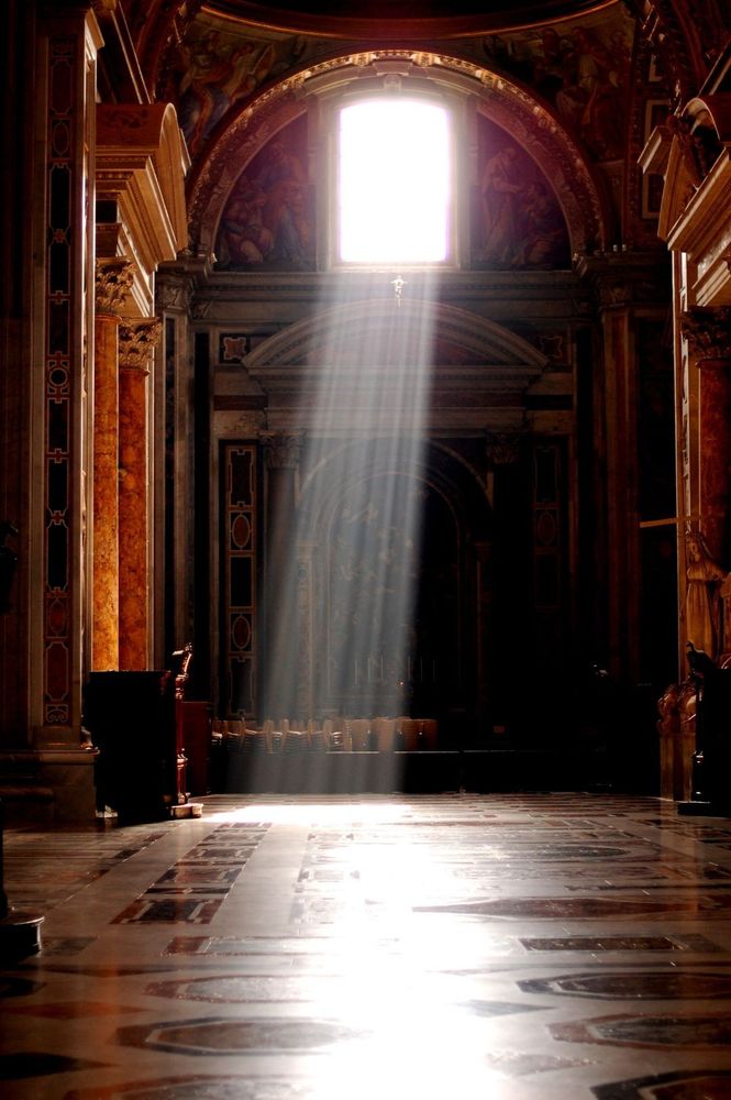A photo of Sunlight Streaming through a window in St. Peter’s Basilica, Vatican City.