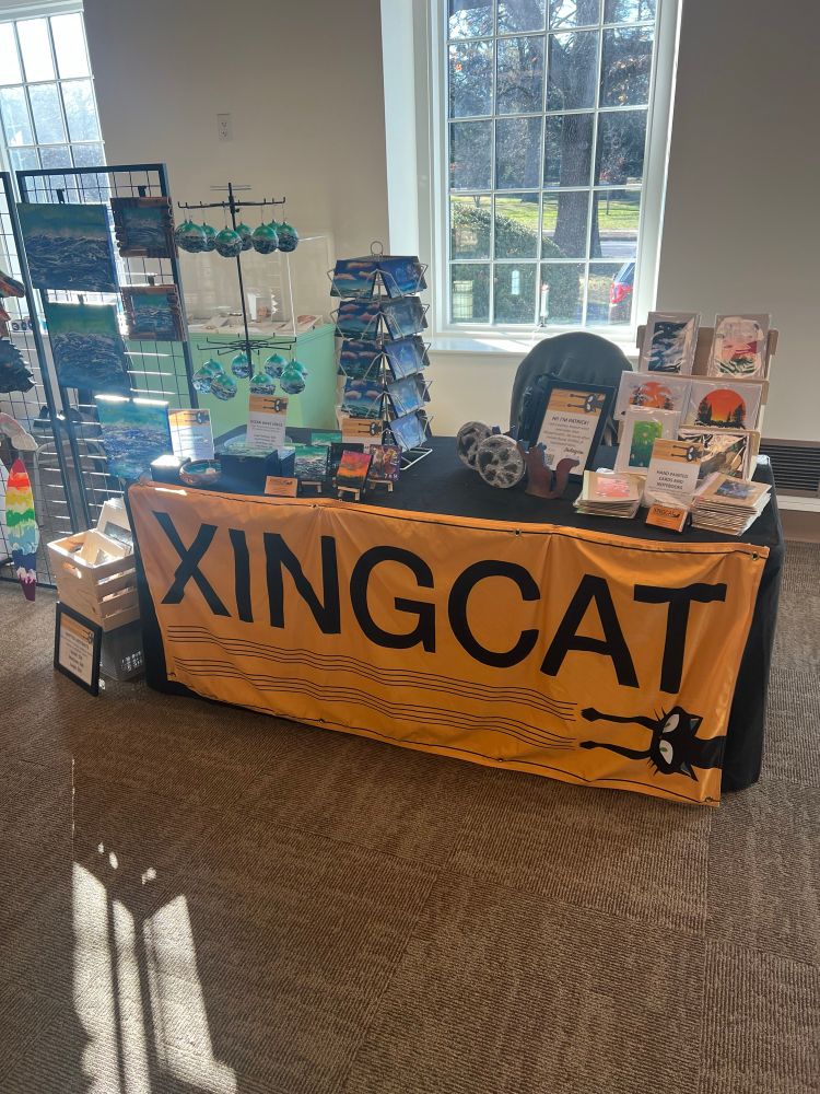 Booth at a holiday arts market. 