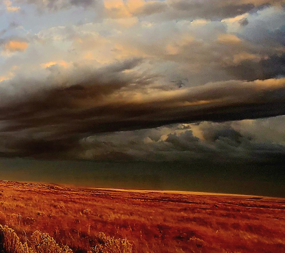 Stormy skies roll across a high desert prairie