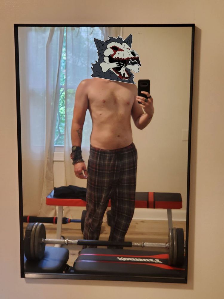 Photo of myself in a mirror with one of my [_] stickers covering my face because y’all don’t need to see that