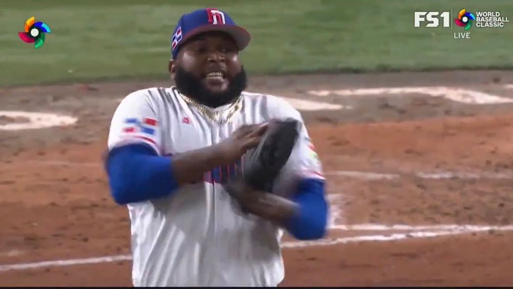 Diego Castillo is wearing his white Dominican Republic jersey during the WBC. He’s on the mound and looking concerned (he probably gave up a bunch of home runs)