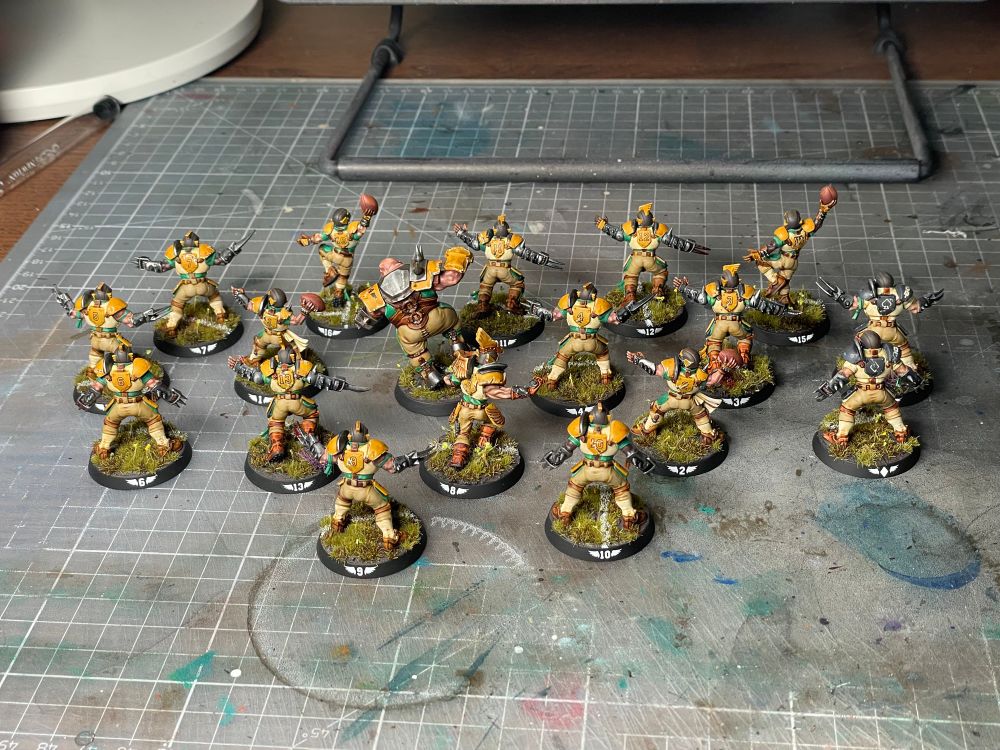 All my “Greenfield Dockers” painted up. On a cutting mat.