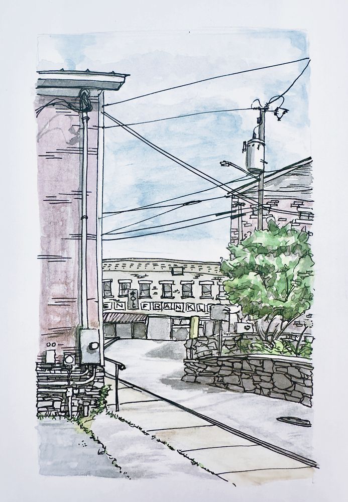 Pen and watercolor, drawing from Middlebury, VT, showing a zigzagging Road, sidewalks, and powerlines with a Ben Franklin mid-century store at the end