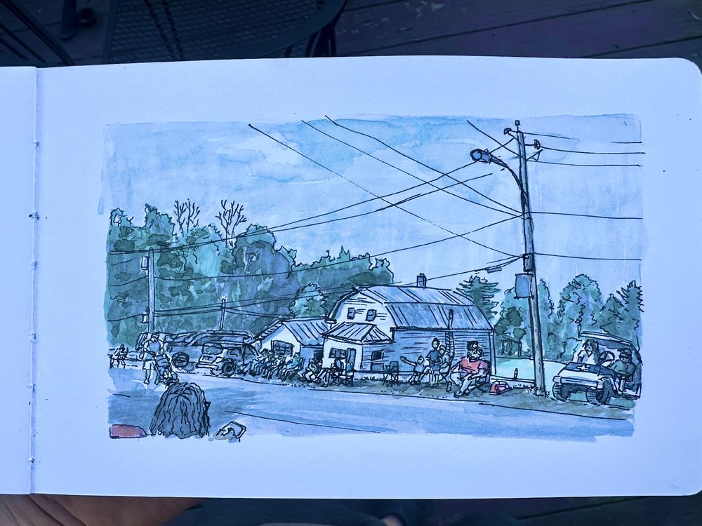  Pen, wash, watercolor of people across the street, waiting in chairs, houses, and trees behind them, no parade in sight yet