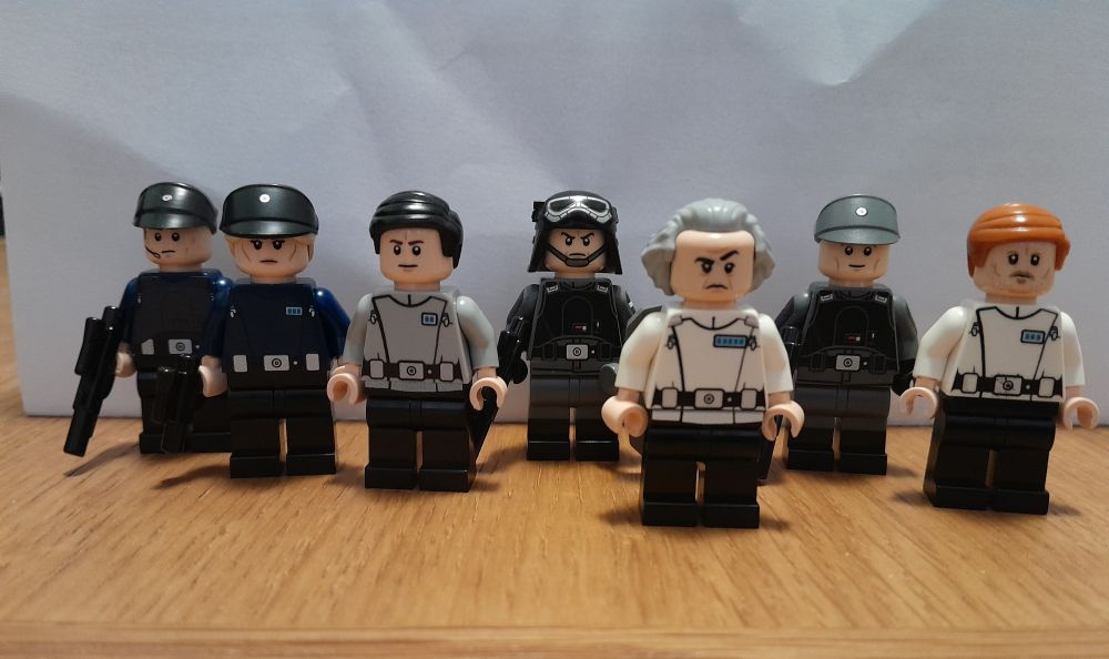 A selection of custom Lego minifigures from Star Wars Andor including Senate security officers, Aldhani troopers and attendant Heert, supervisor Yung and Major Partagaz. Made by Hall of Bricks.