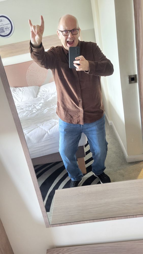 Old man giving it the horns