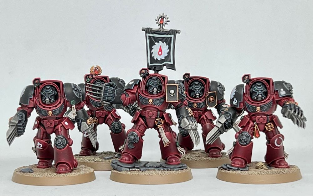Converted Flesh Tearers Terminator Assault Squad mixing new Terminator bodies with older lightning claws.