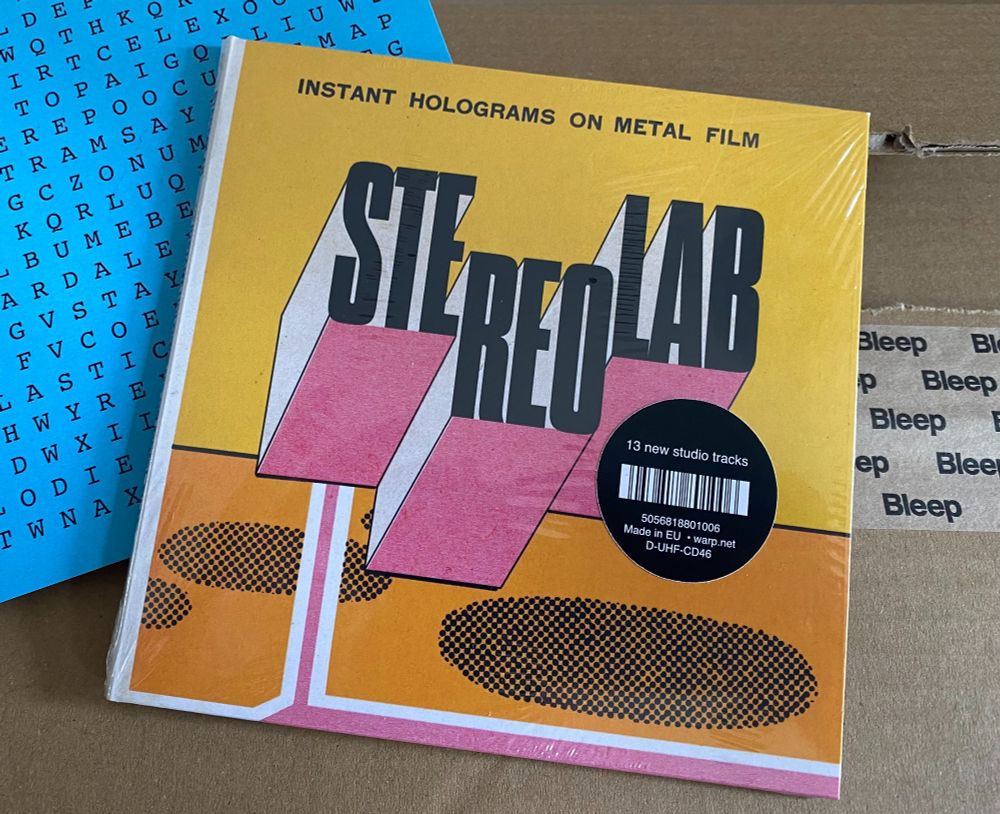 A copy of the new Stereolab album, "Instant Holograms on Metal Film", which has just come in the post.